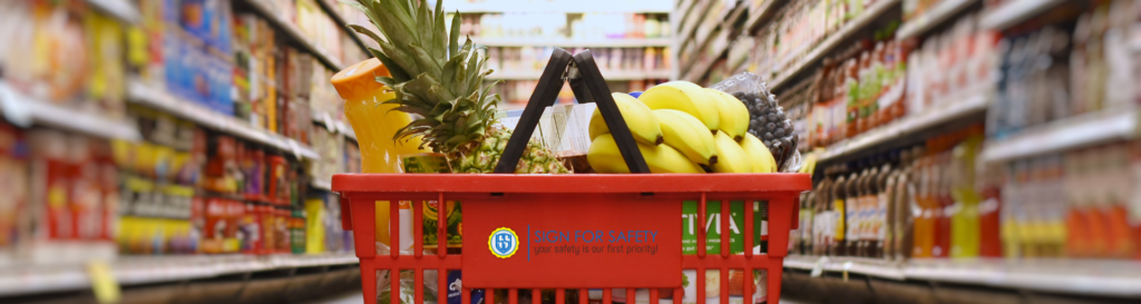 Shopping basket filled with various essential products, representing convenience and quality.